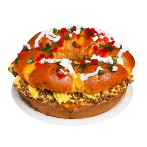 Rosca de reyes relleno de crema pastelera y grajeas de chocolate